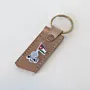 Handcrafted Leather Keychain with Jordan Flag and Raised Fist