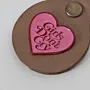 Handcrafted Leather Keychain with Girls Don't Cry Heart Design