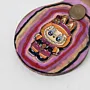 Natural Leather Keychain with Labubu Character on Colorful Background