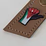 Natural Leather Keychain with Jordanian Raised Fist on Long Tag
