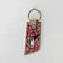 Natural Leather Keychain with Jordanian Raised Fist on Patterned Tag