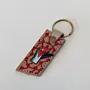 Natural Leather Keychain with Jordanian Raised Fist on Patterned Tag
