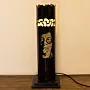 Black Acrylic Table Lamp with Abstract Face and Warm Light