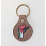 Natural Leather Keychain with Raised Fist in Jordan Flag Colors