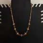 Handcrafted Bohemian Necklace in bone beads with Distinctive Detail