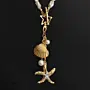 Handcrafted Contemporary Necklace in faux pearl with Distinctive Detail