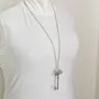  silver-plated metal with Key of Return detail
