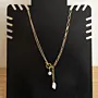 Handcrafted Pearl Shell Gold-Plated Necklace with Distinctive Detail