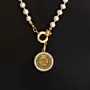 Contemporary Necklace in cultured pearl with coin detail