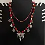 Handcrafted Heritage-Inspired Necklace in coral with Distinctive Detail