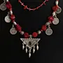 Handcrafted Heritage-Inspired Necklace in coral with Distinctive Detail