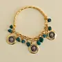 Contemporary Bracelet in turquoise with coin detail