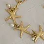 Contemporary Bracelet in cultured pearl with star detail