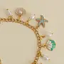 Handcrafted Ivory and Mint Sea Charm Bracelet with Distinctive Detail
