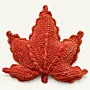 Maple Leaf Crochet Cushion in Rust Orange
