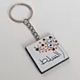 Personalized Wooden Arabic Name Keychain with Orange Blue Dot Spray - 4 x 4 cm