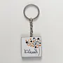 Personalized Wooden Arabic Name Keychain with Orange Blue Dot Spray - 4 x 4 cm