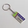 Personalized Arabic Name Keychain with Narrow Purple Green Motif - 4 x 2 cm