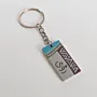 Personalized Arabic Name Keychain with Narrow Brown Aqua Pattern - 4 x 2 cm