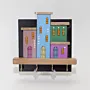 Handmade Wooden Wall Key Holder with Colorful Houses on Black Backdrop Design