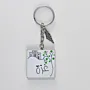 Personalized Wooden Arabic Name Keychain with Green Dot Skyline - 4 x 4 cm