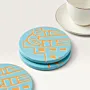 Round Turquoise Ceramic Coaster with Heritage Carving