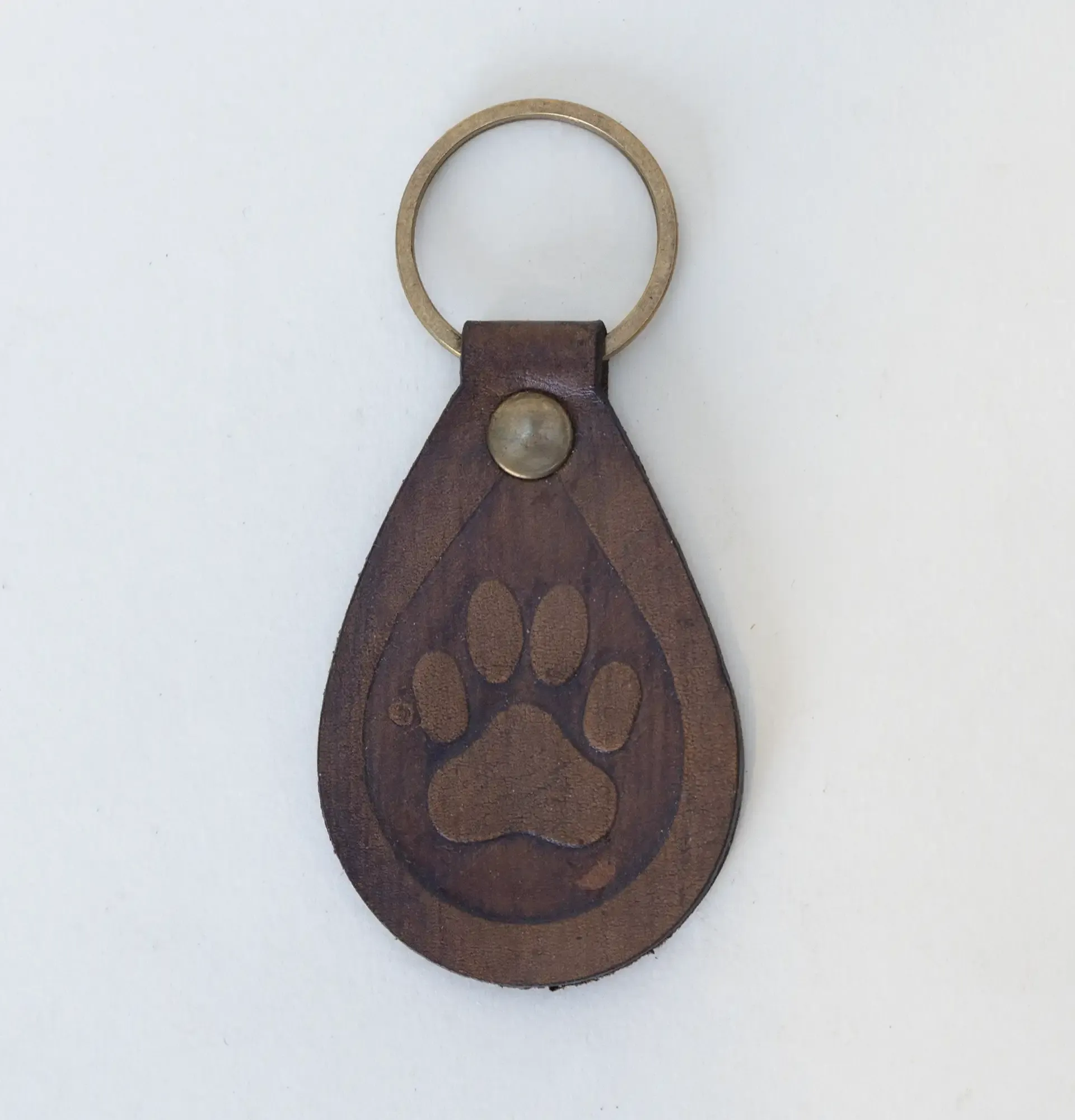 Handcrafted Leather Keychain with Dark Embossed Animal Paw Print