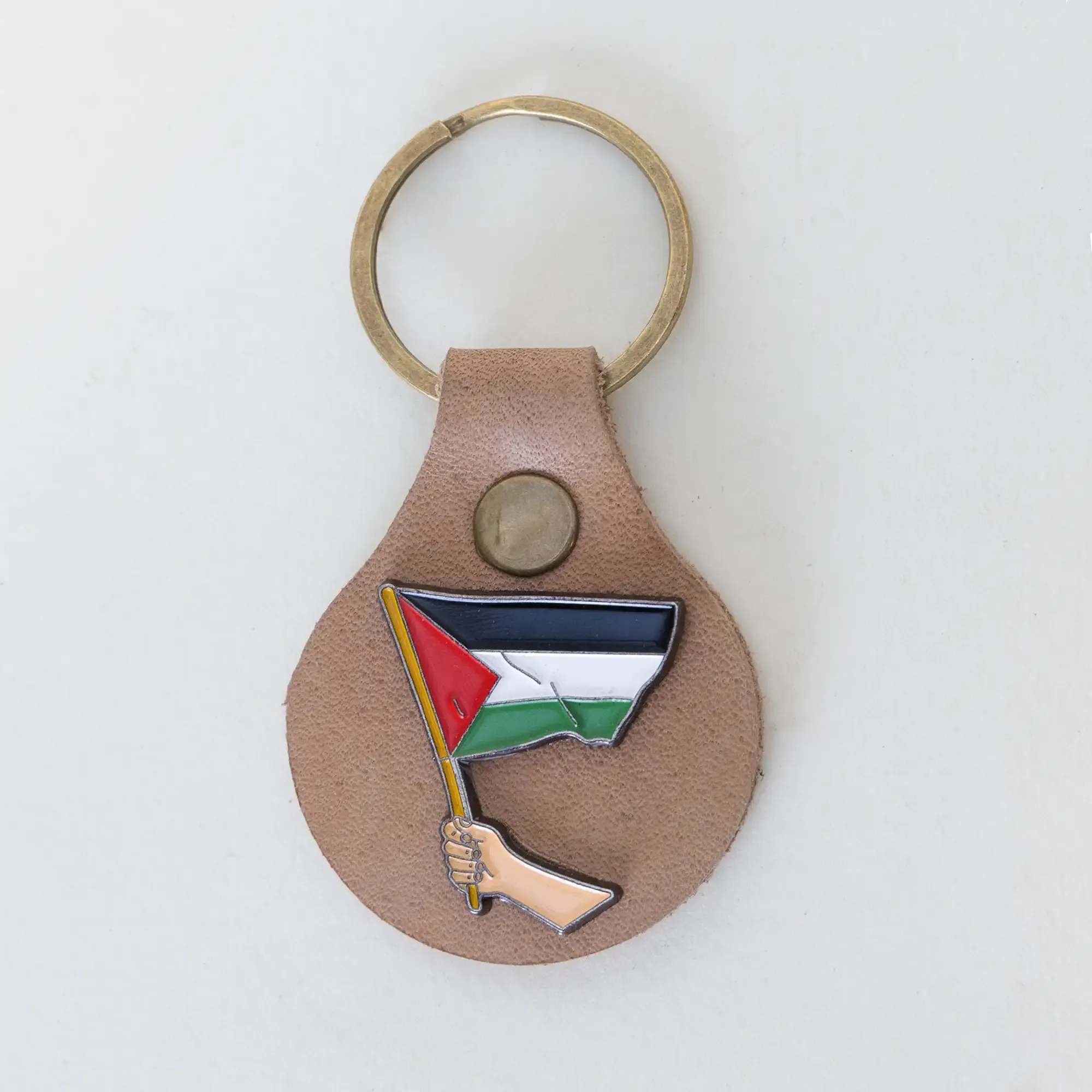 Handmade Leather Keychain with Hand Holding the Palestine Flag
