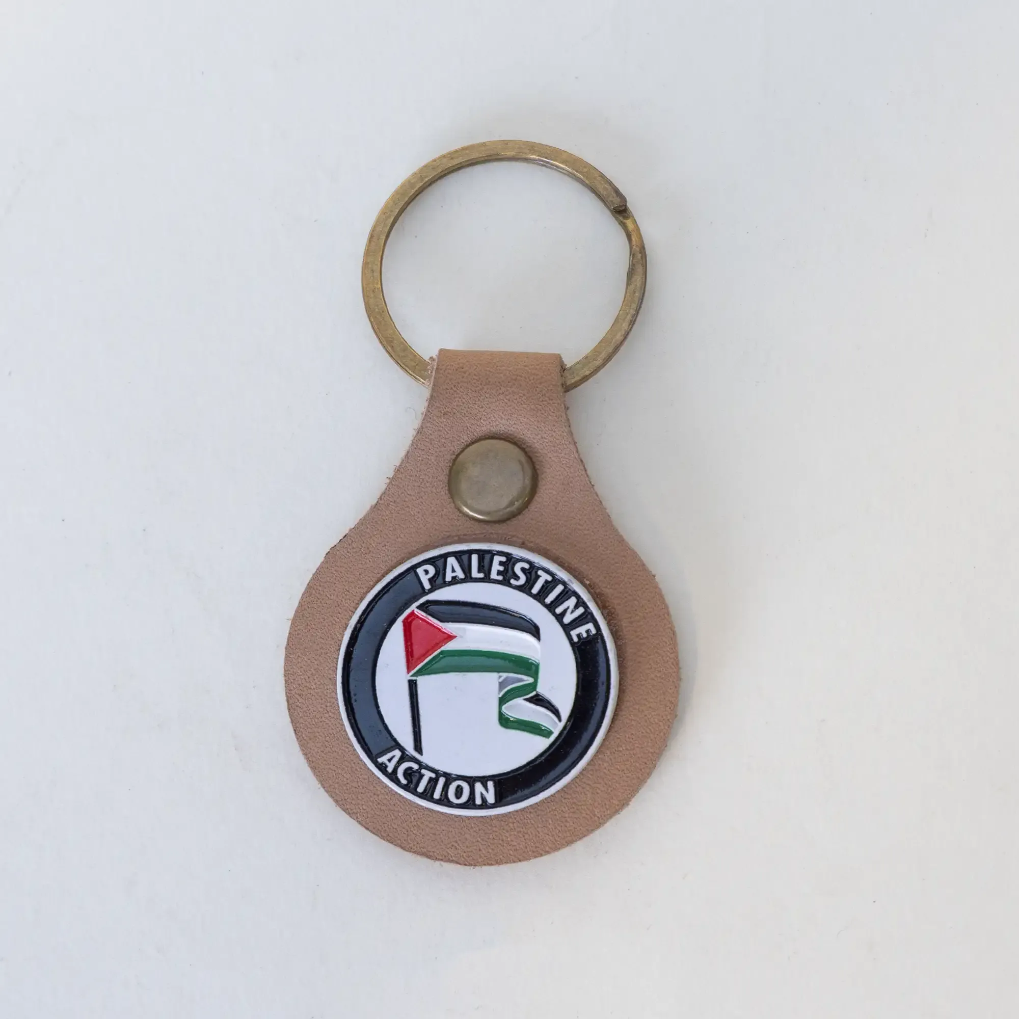 Handcrafted Leather Keychain with Round Palestine Action Emblem