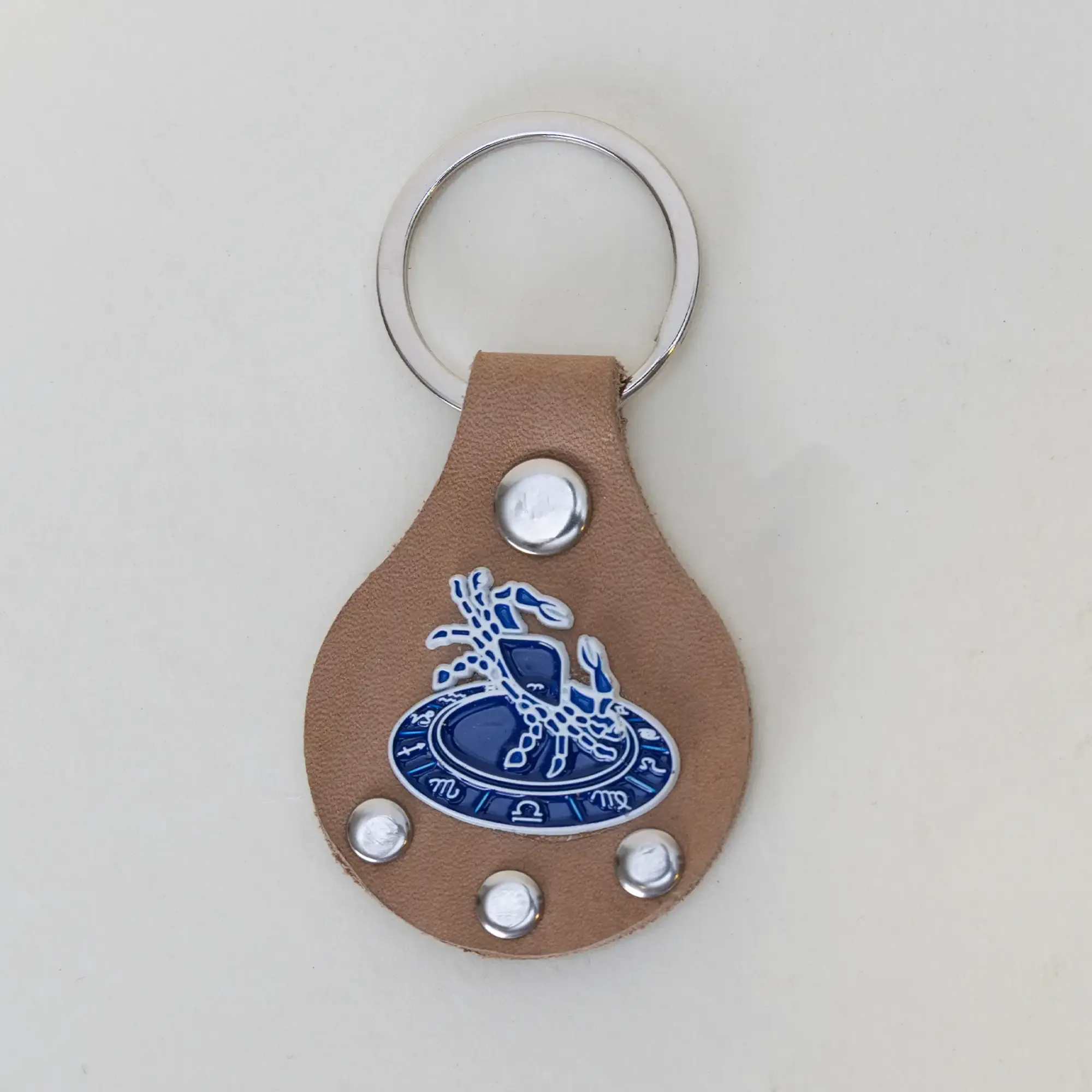 Artisan Natural Leather Keychain with Blue Scorpio Zodiac Emblem