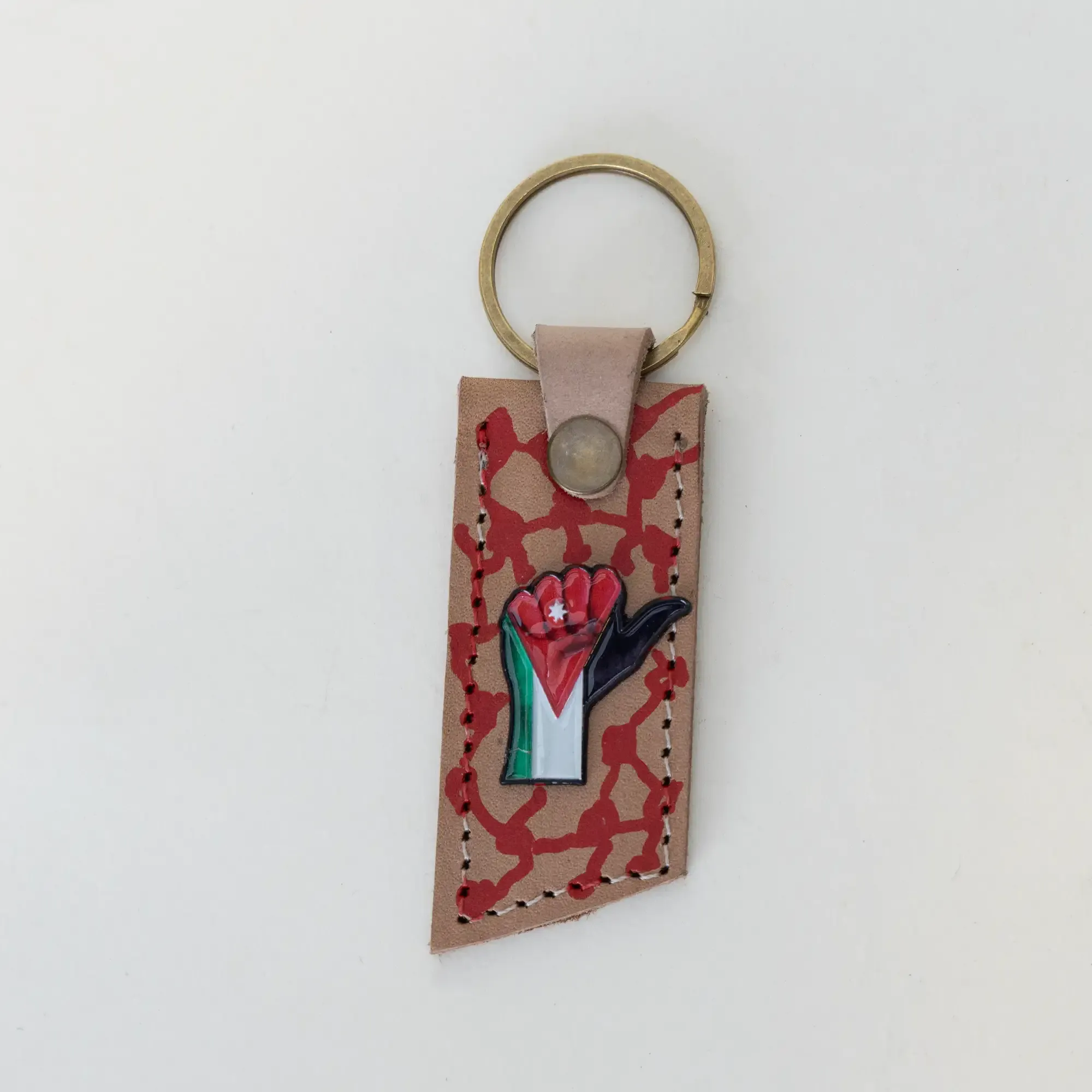 Natural Leather Keychain with Jordanian Raised Fist on Patterned Tag