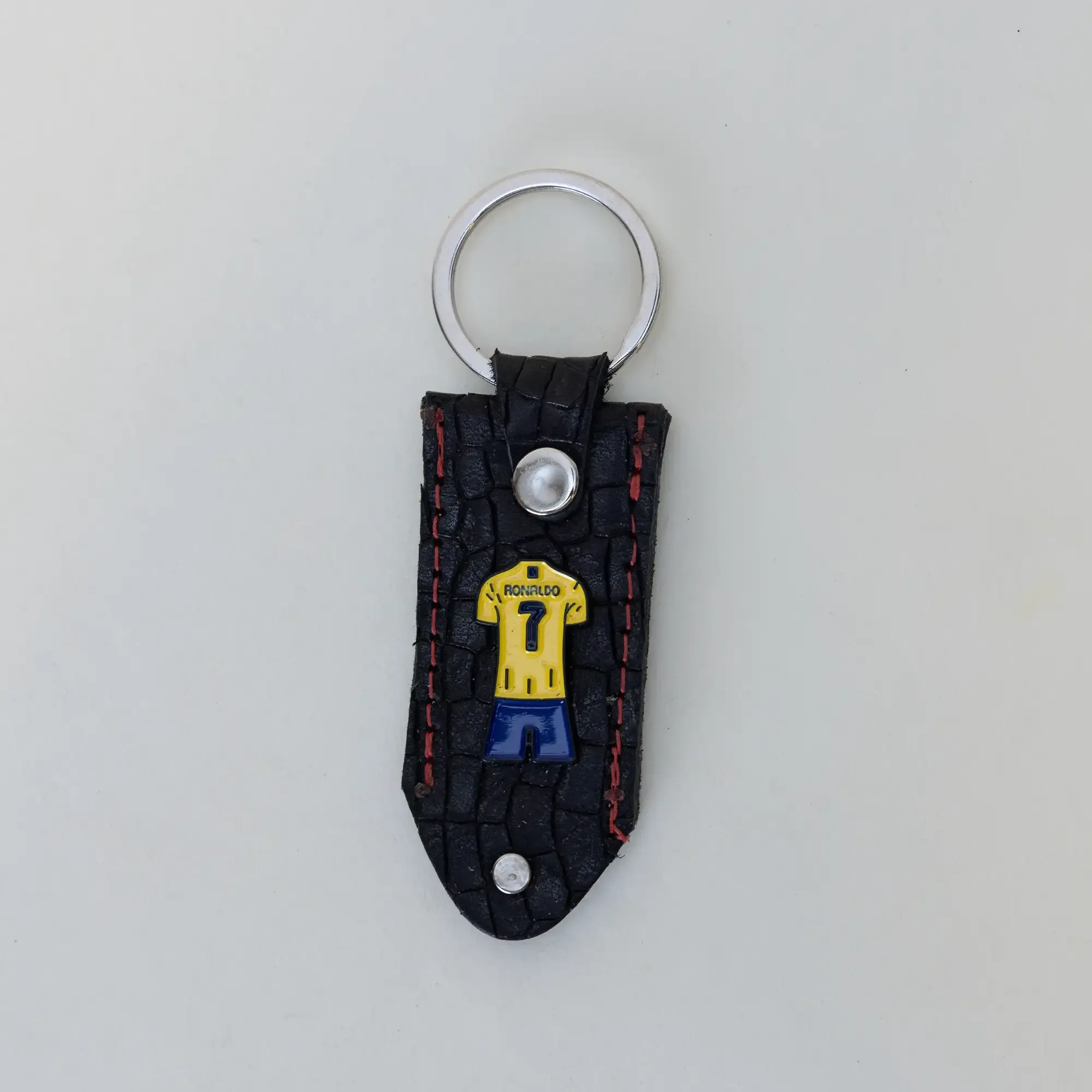 Natural Leather Keychain with Black Tag with Yellow Number 7 Jersey
