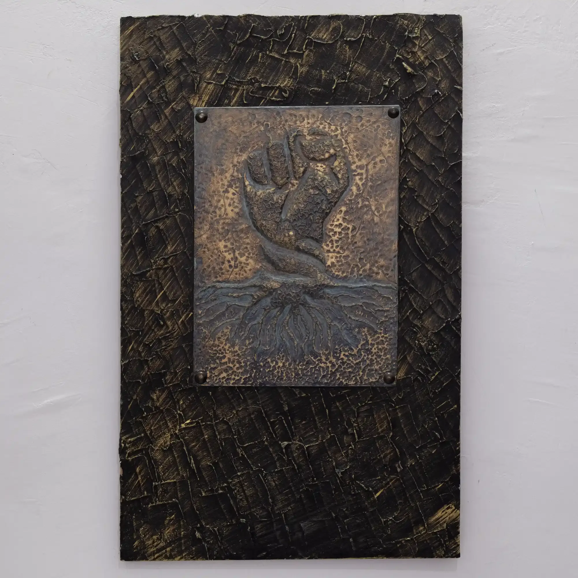 Handcrafted Raised Fist Relief Wall Art with Artisan Details
