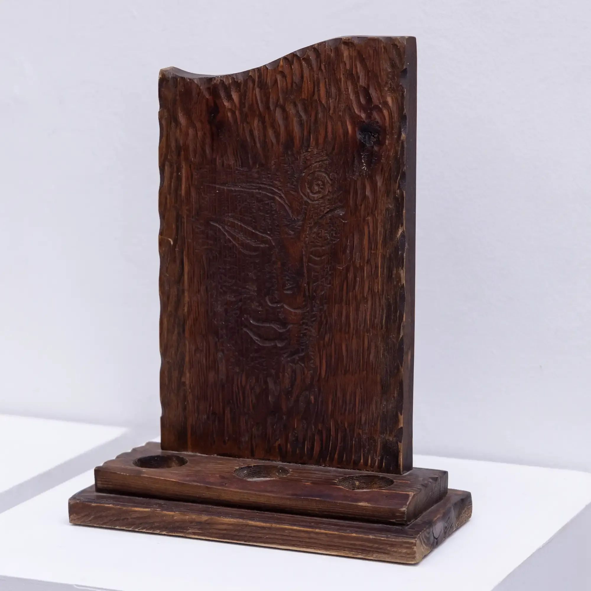 Handmade Dark Engraved Wood Table Decor with Artisan Details