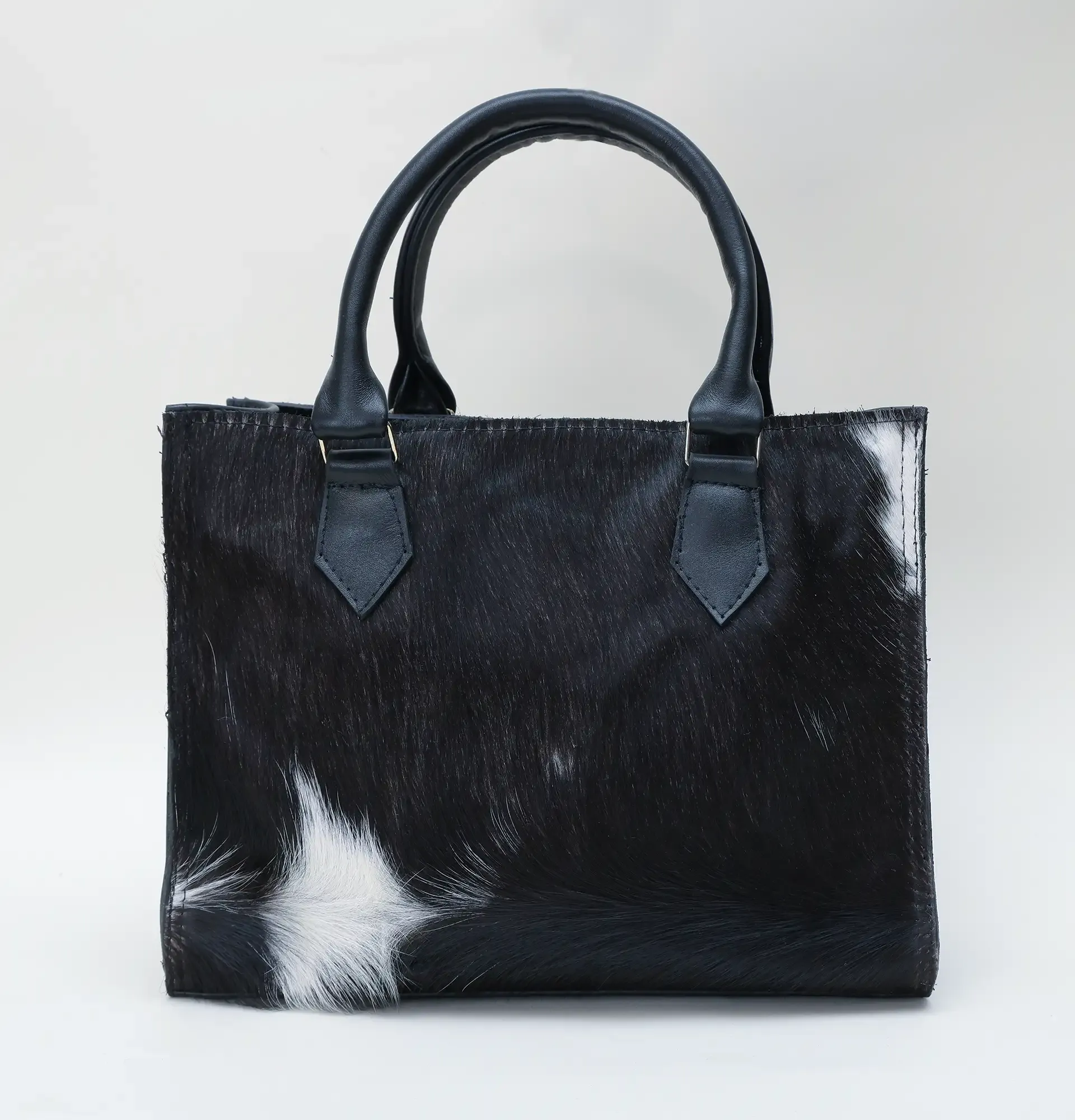 Artisan-Made Black Cowhide Leather Handbag with Hand-Finished Details