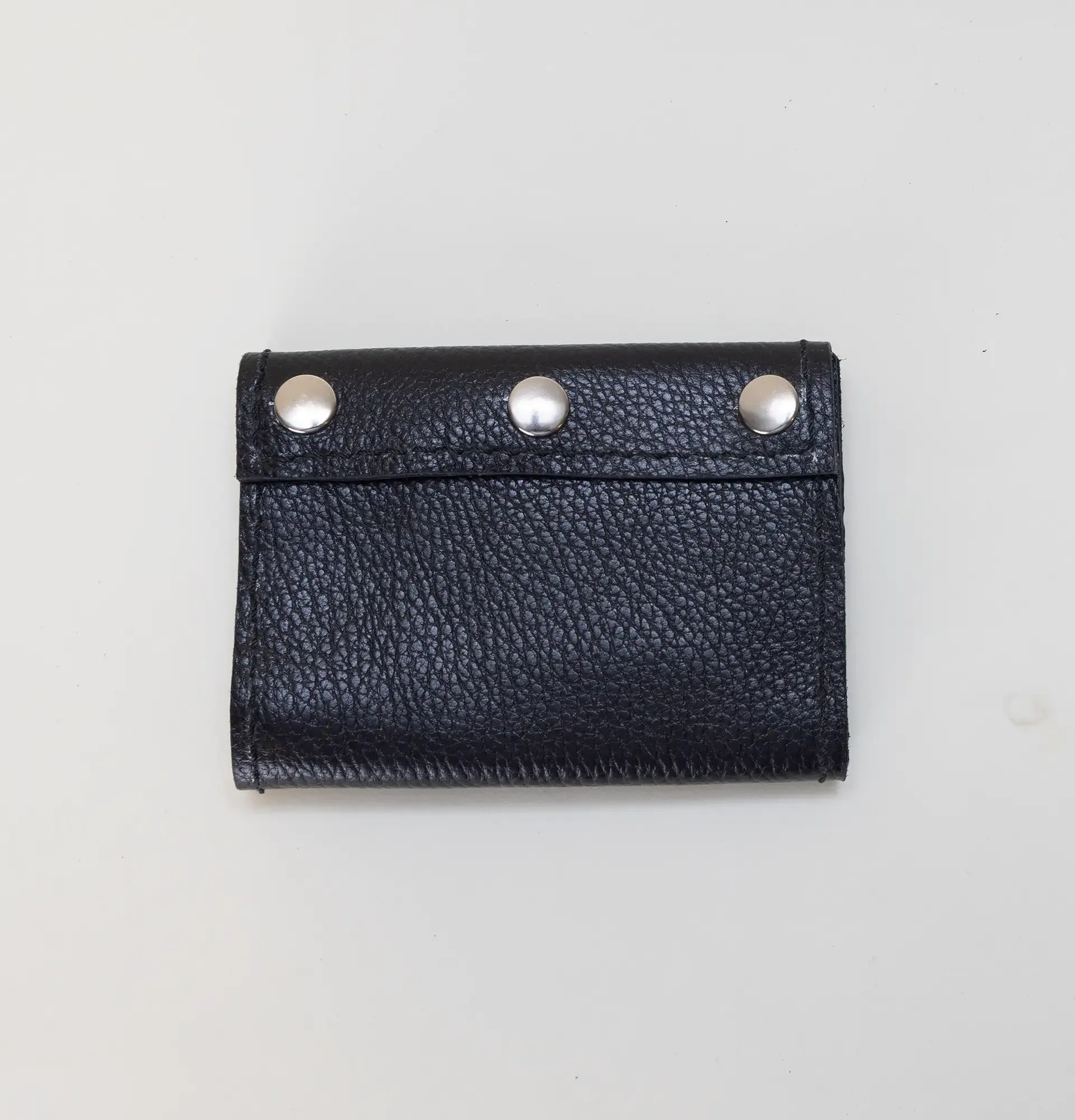 Artisan-Made Compact Black Riveted Wallet with Hand-Finished Details
