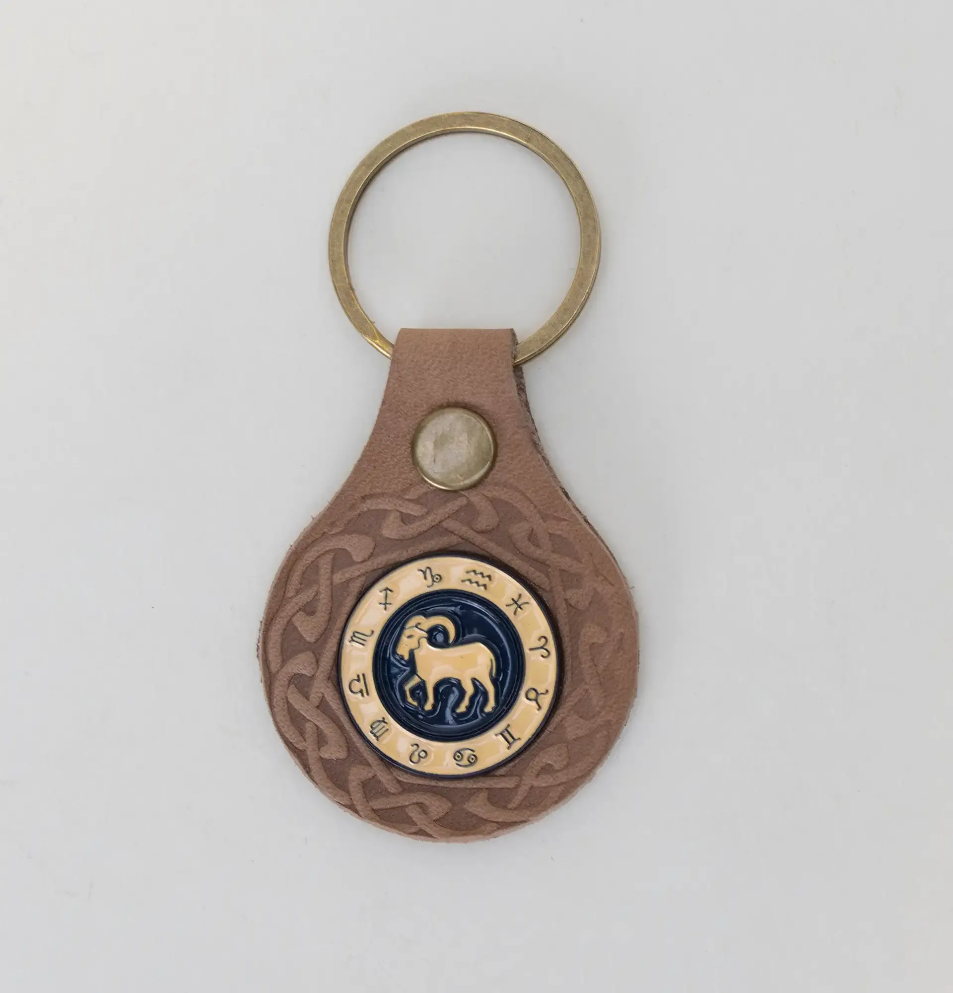 Natural Leather Keychain with Round Goat Emblem Artisan Design