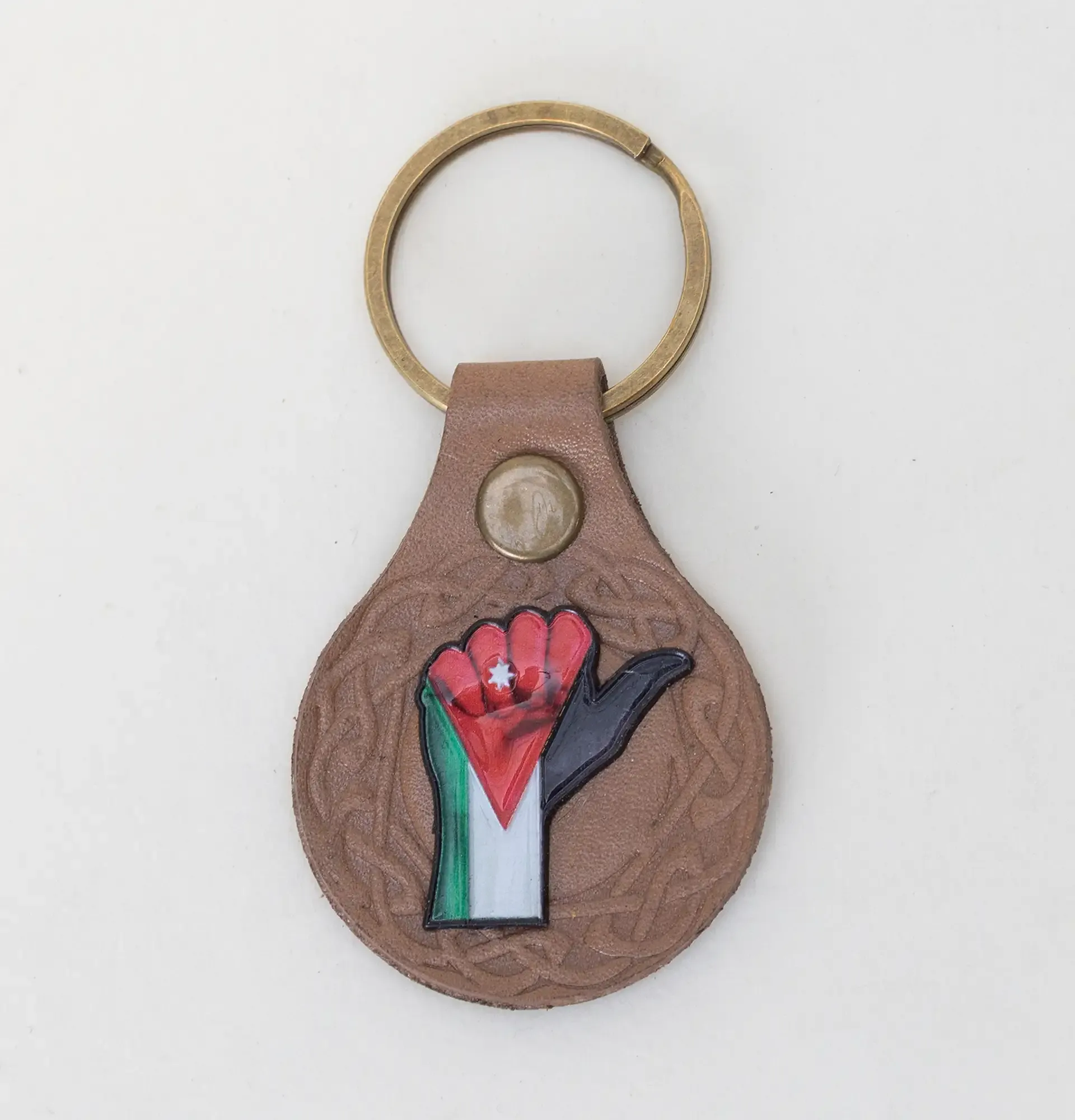 Natural Leather Keychain with Raised Fist in Jordan Flag Colors