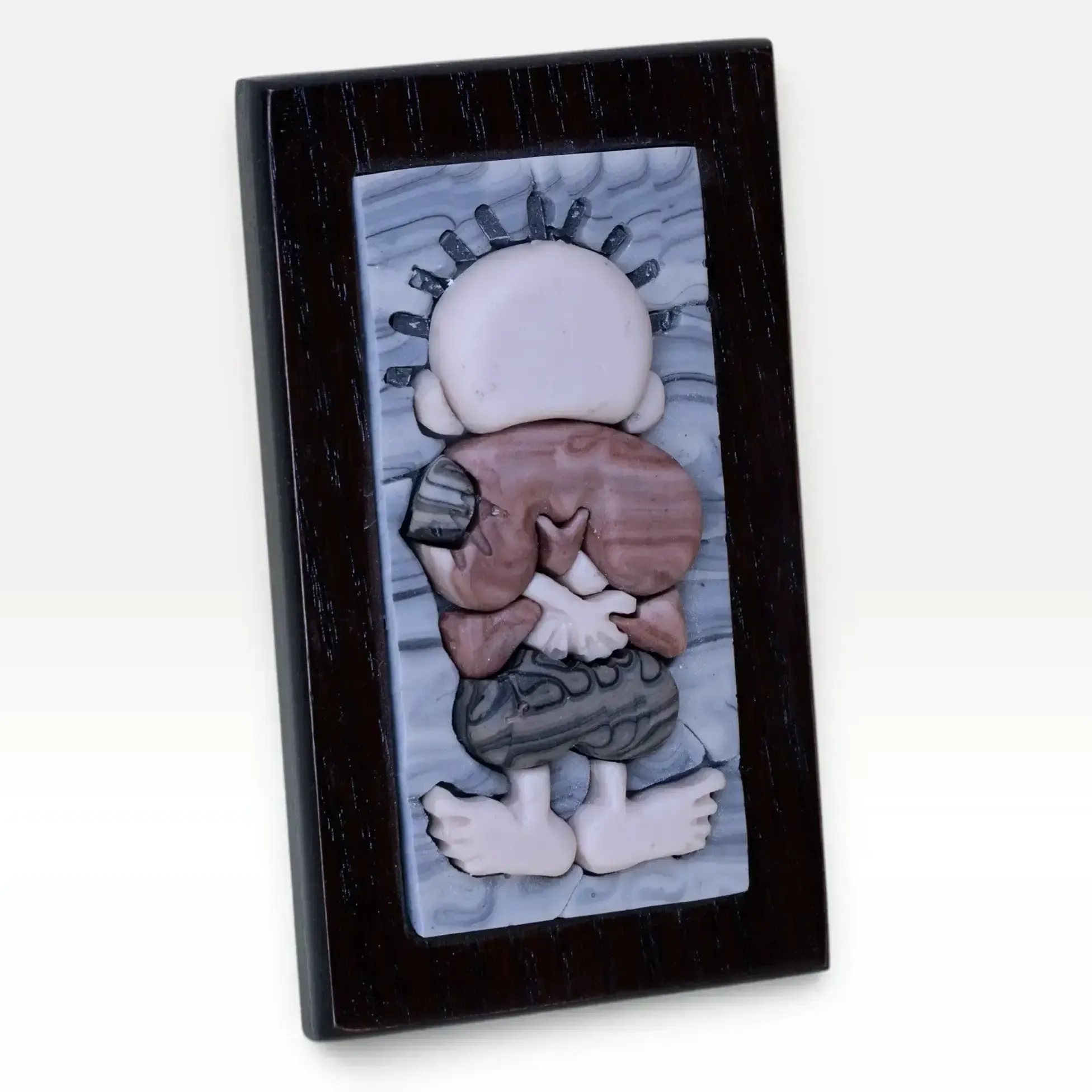 Handala-Inspired Brown Stone Mosaic Wall Art