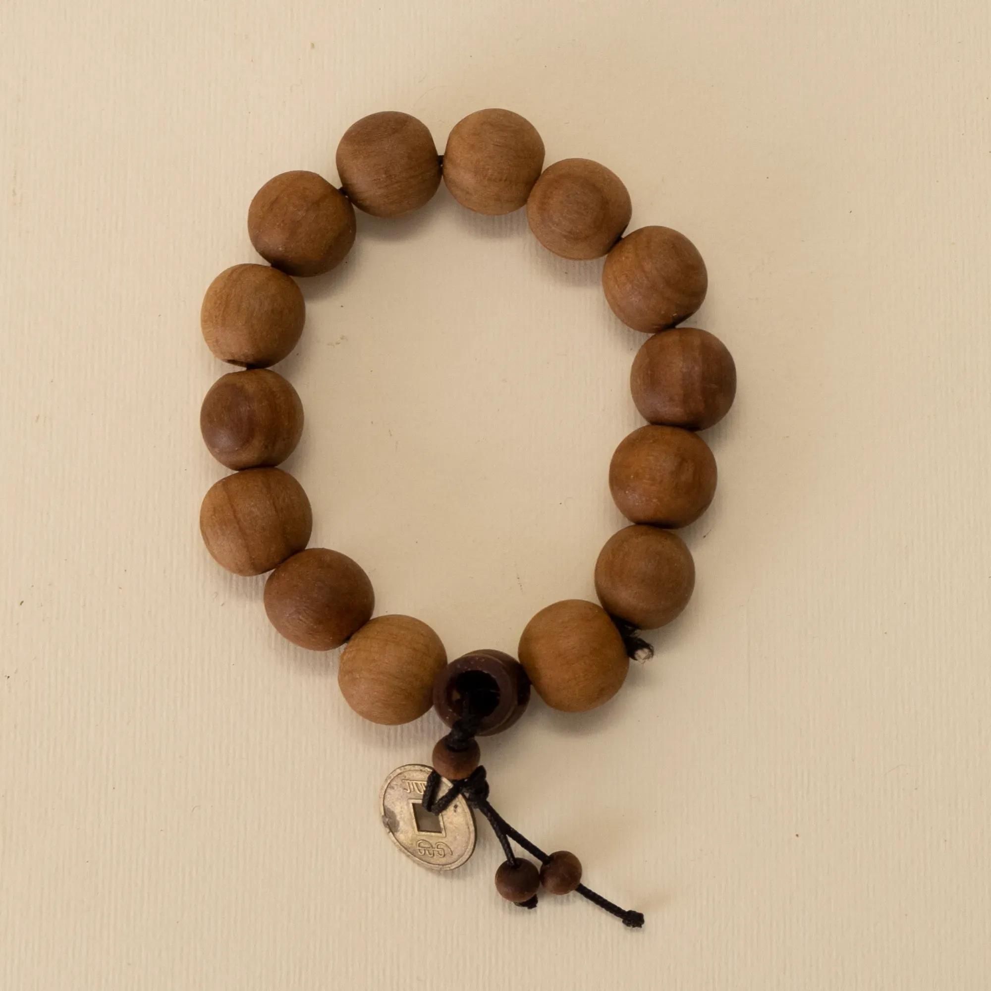 Handmade Olive Wood Bead Bracelet with Round Wooden Pendant Detail
