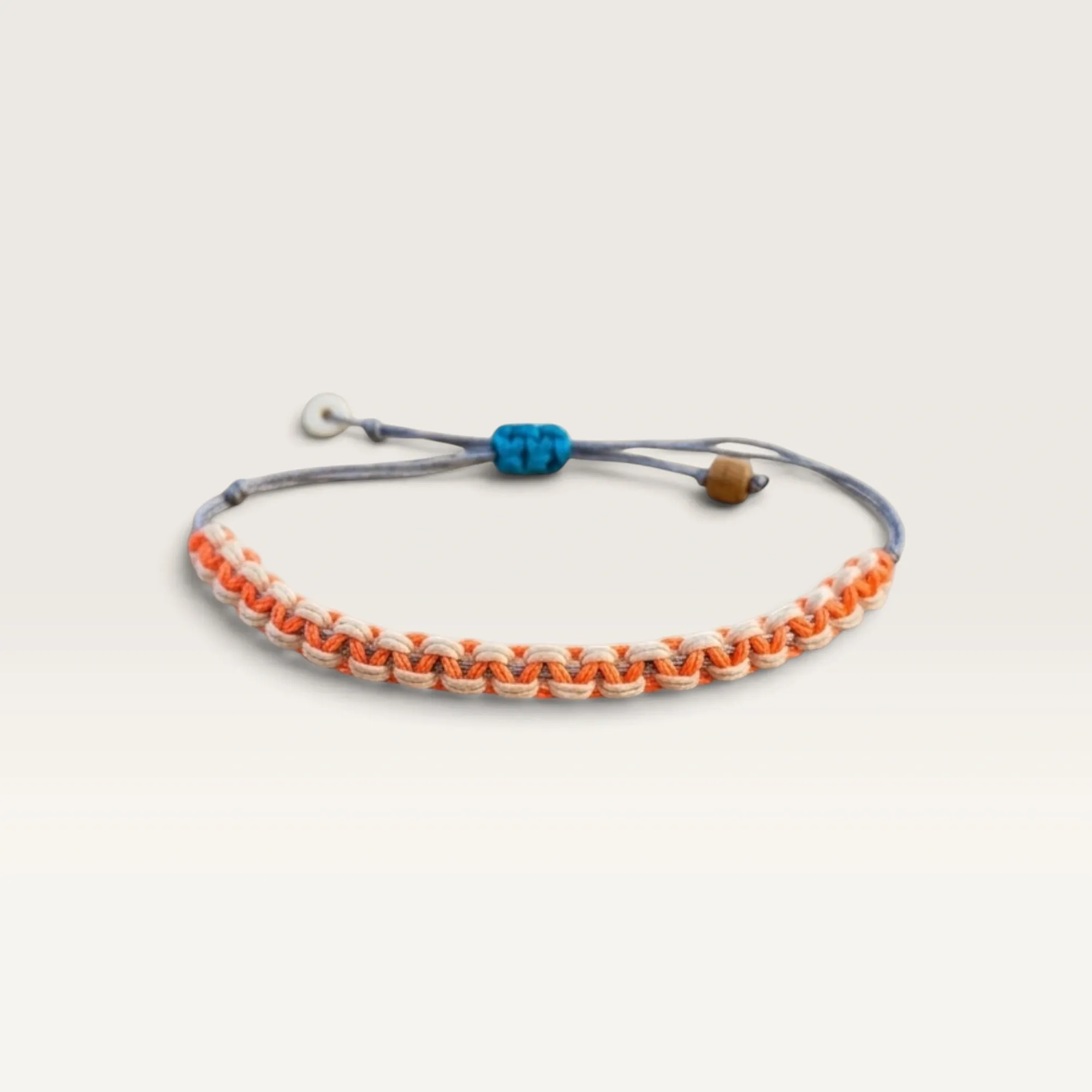 Orange and White Braided Cord Bracelet with Blue Knot