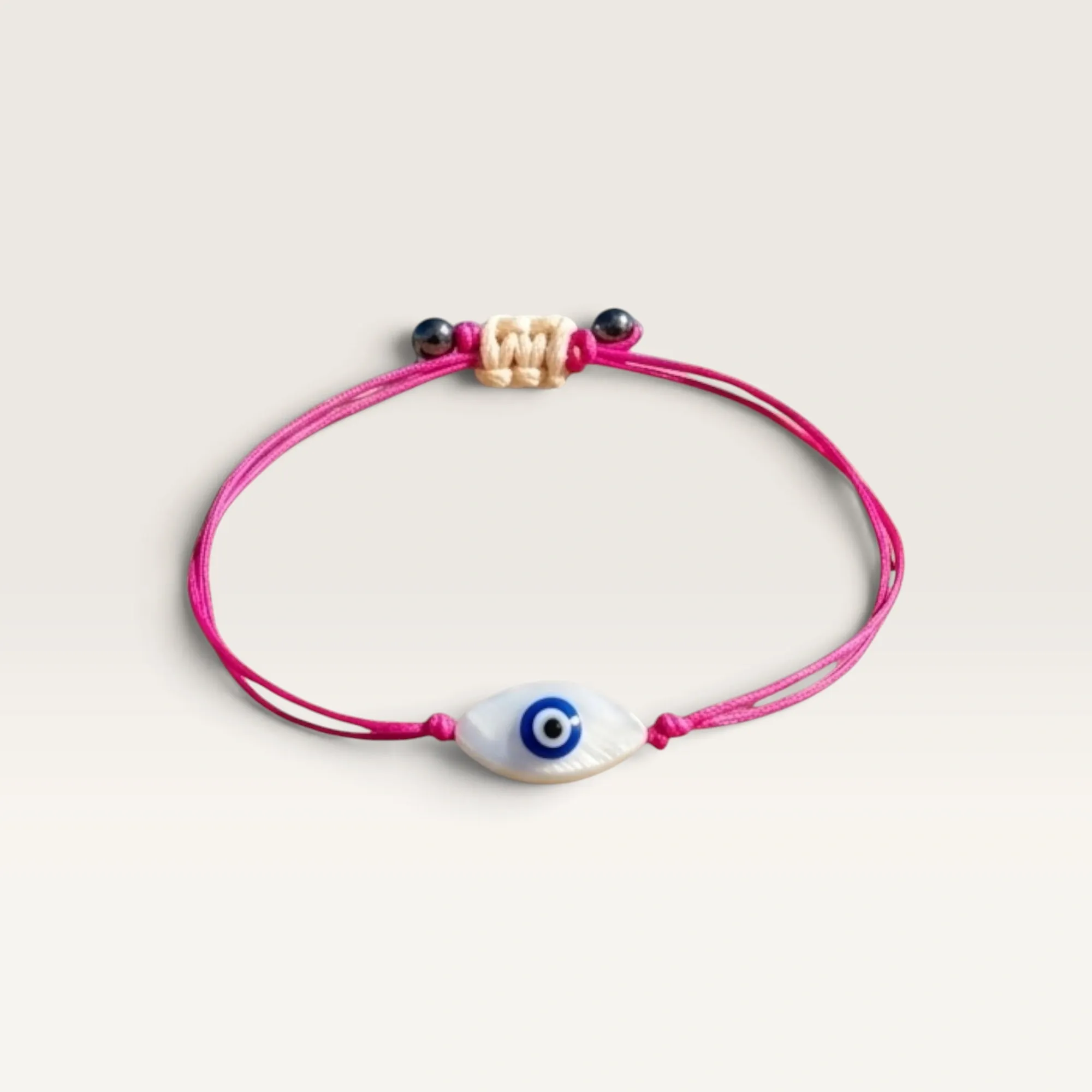 Pink Cord Bracelet with Blue Evil Eye Bead for Everyday Wear