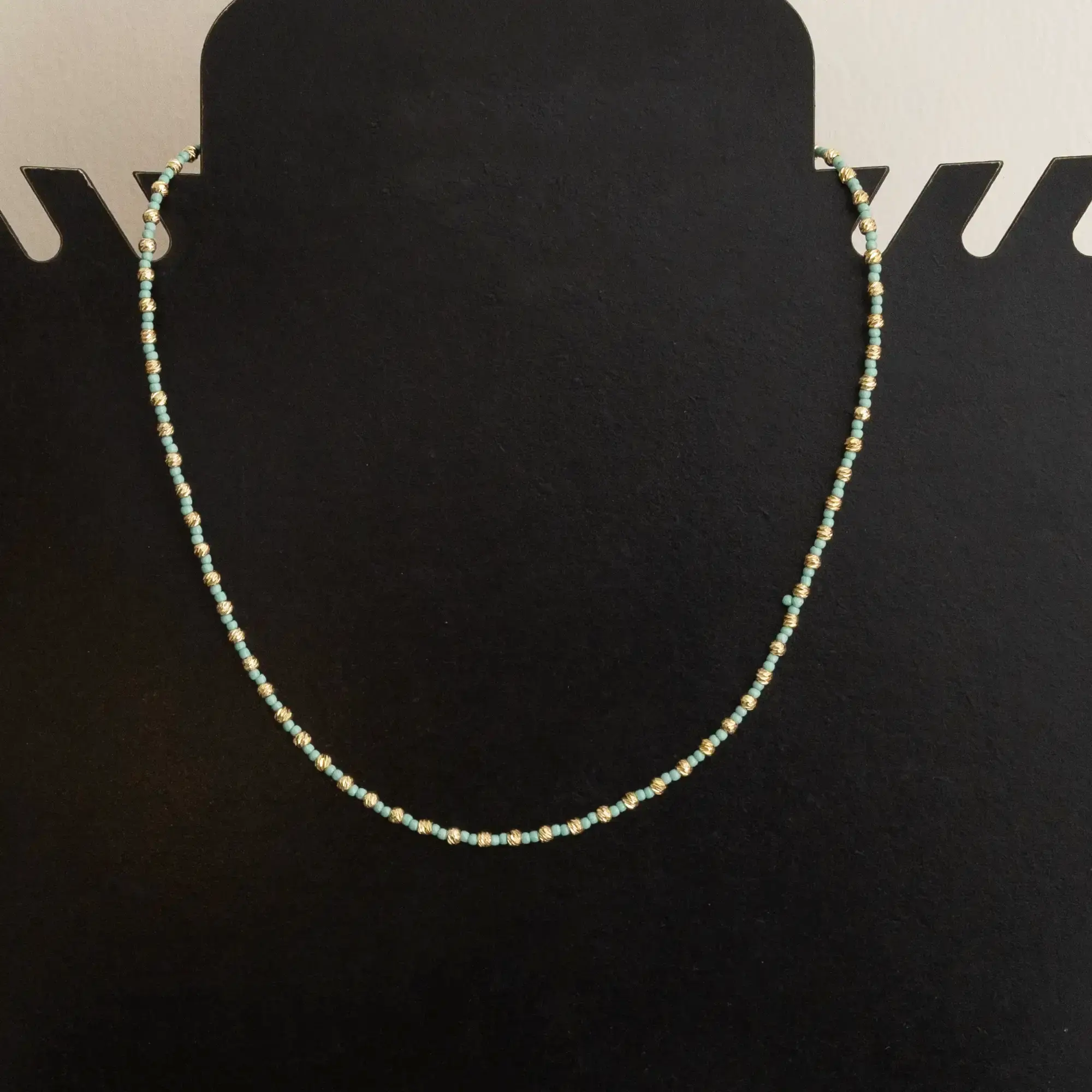 Handcrafted Contemporary Necklace in turquoise with Distinctive Detail