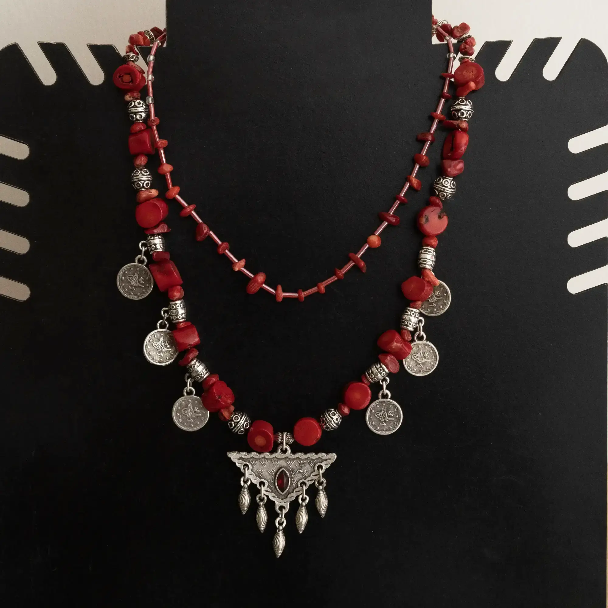 Handcrafted Heritage-Inspired Necklace in coral with Distinctive Detail