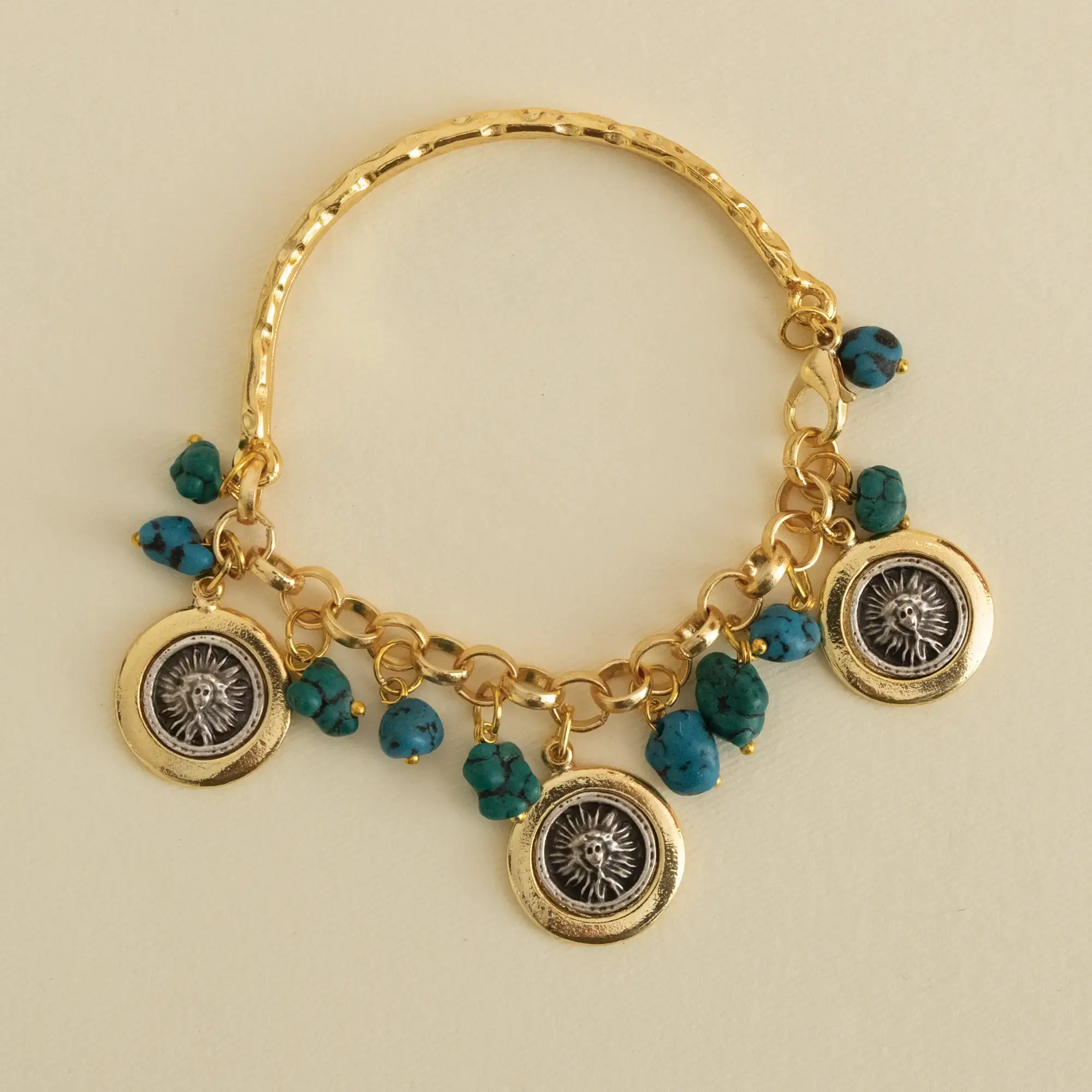 Contemporary Bracelet in turquoise with coin detail