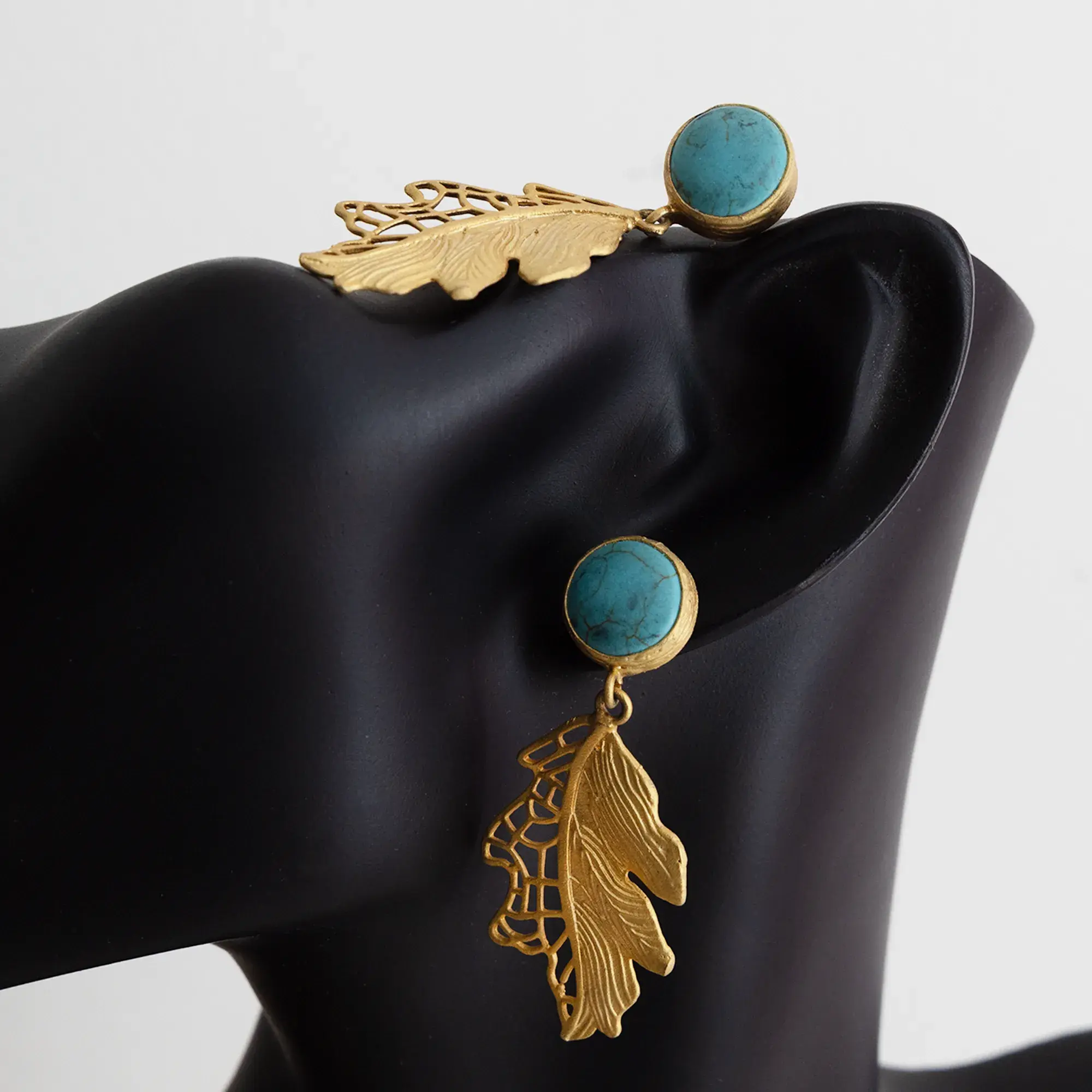 Contemporary Earrings in turquoise with leaf detail