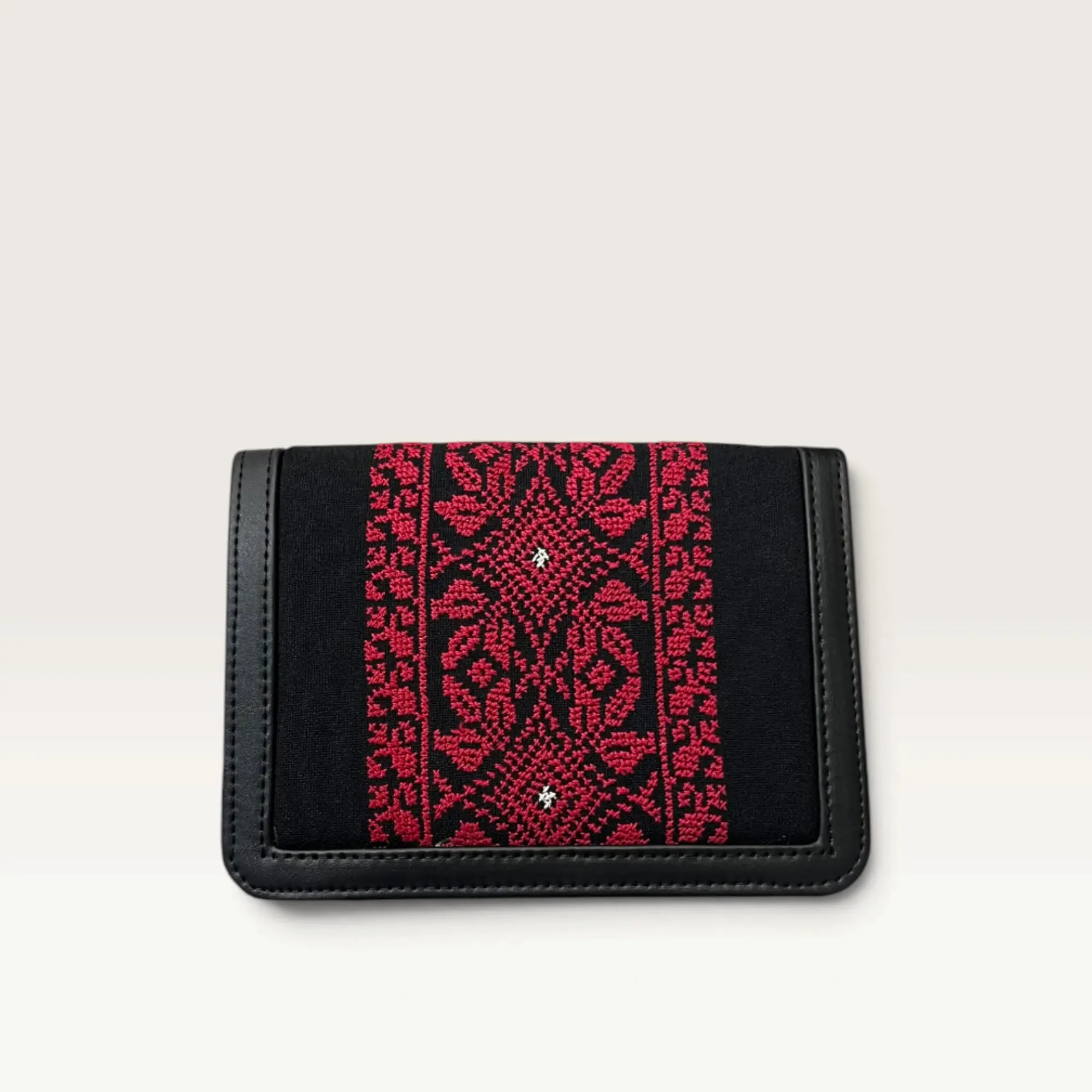 Black Square Crossbody Bag with red geometric cross-stitch panel