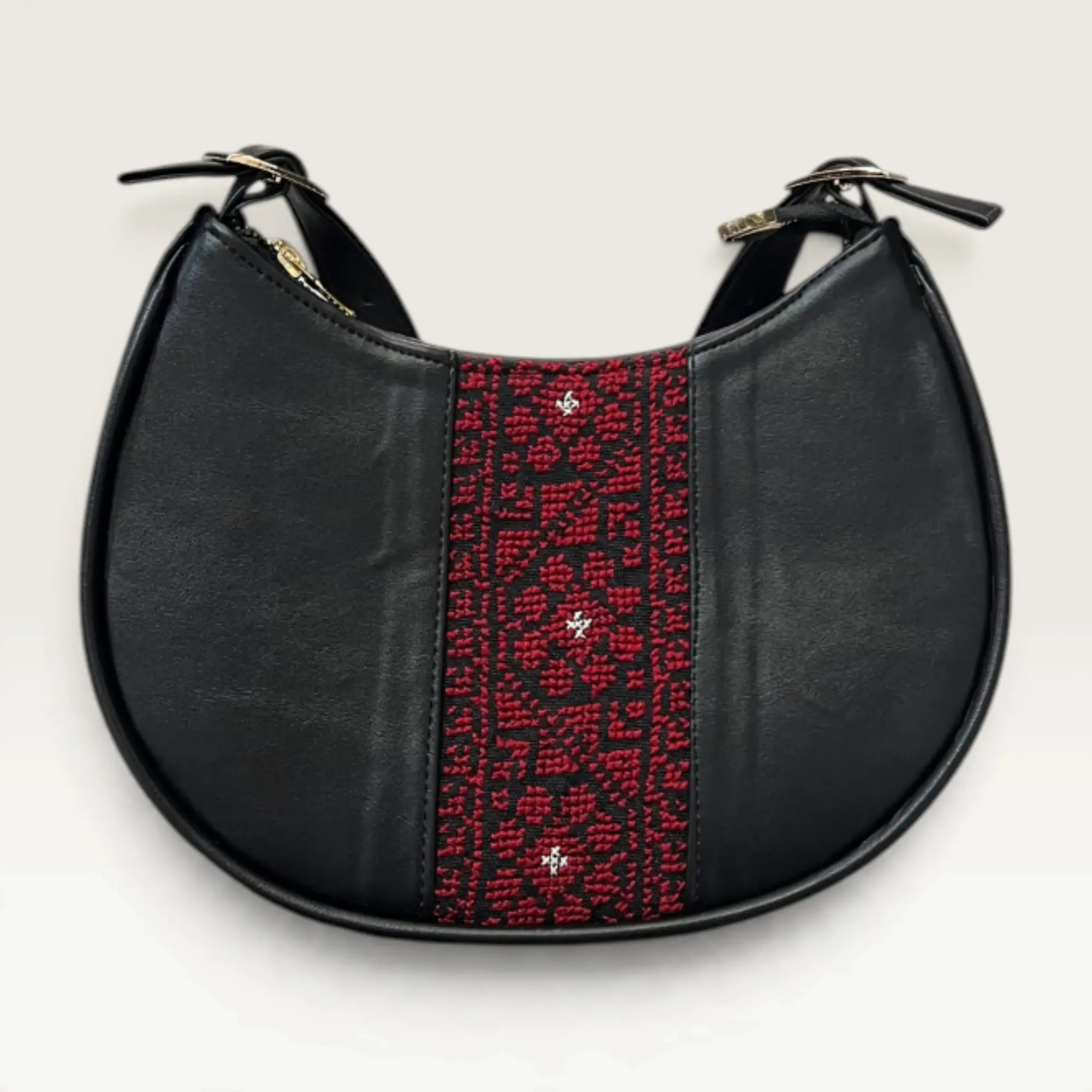 Black Half-Moon Shoulder Bag with red geometric heritage panel
