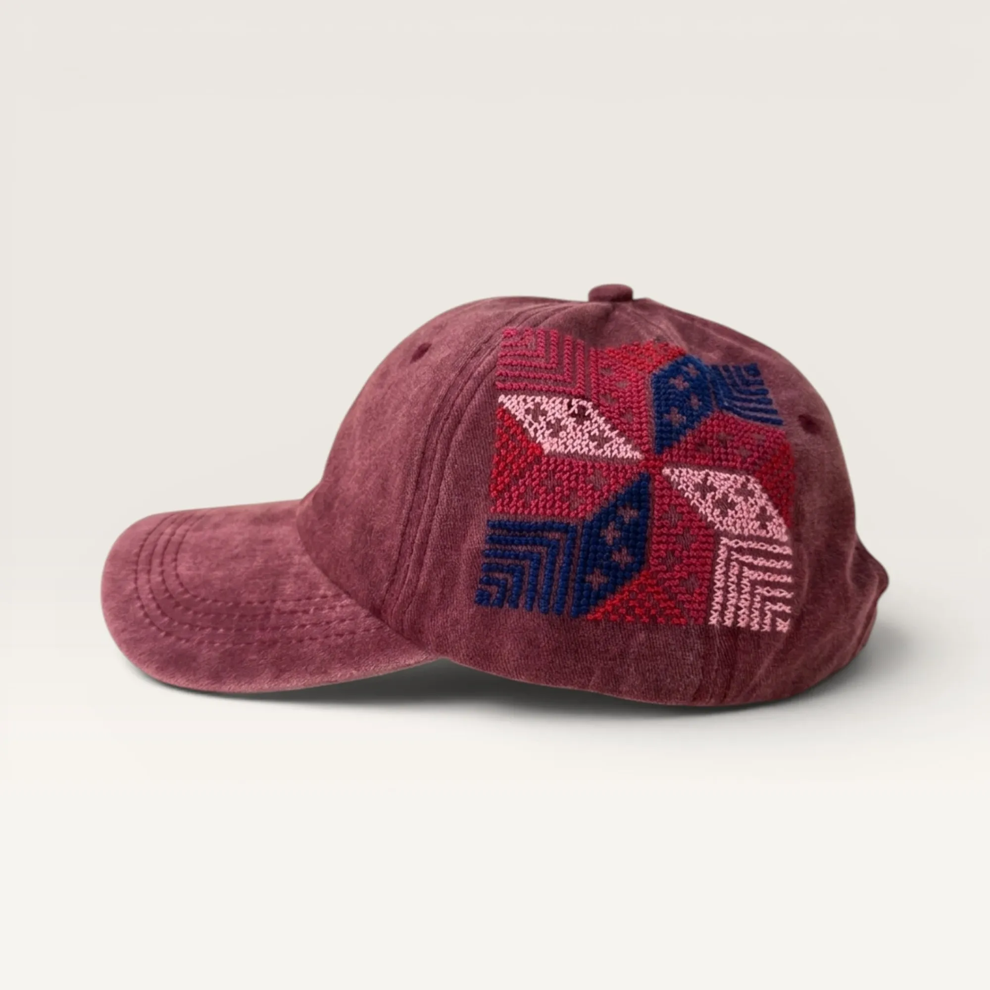 Najma w Reesh Maroon Feather Star Embroidered Cap by Boqaa Heritage