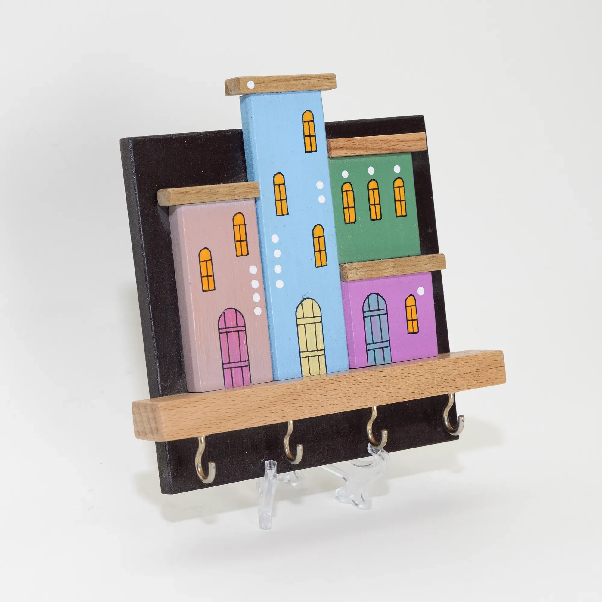 Handmade Wooden Wall Key Holder with Colorful Houses on Black Backdrop Design
